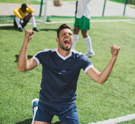 happy-soccer-player-celebrating-goal-during-soccer-2021-08-30-19-50-52-utc-e1664380661430.jpg